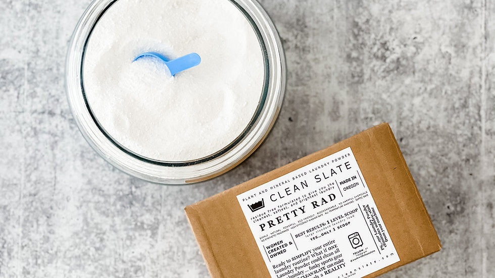 A large glass jar filled with white powder sits next to a smaller brown box with a white label.