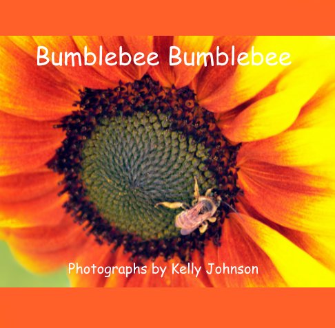 A bright orange and yellow flower with a bee in the center.