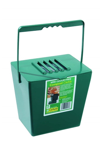 A green compost caddy with a handle