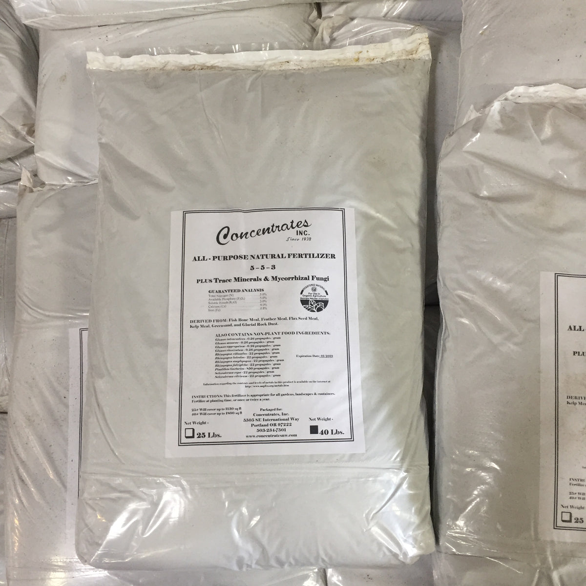 Clear bags of white, powdery fertilizer