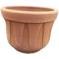 A terracotta pot with a thick border and triangular design on the sides.