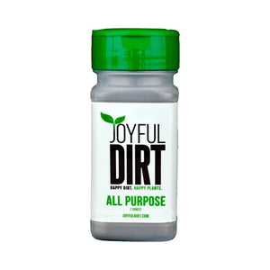A small container of fertilizer with a green lid. It has a white label with the Joyful Dirt logo.
