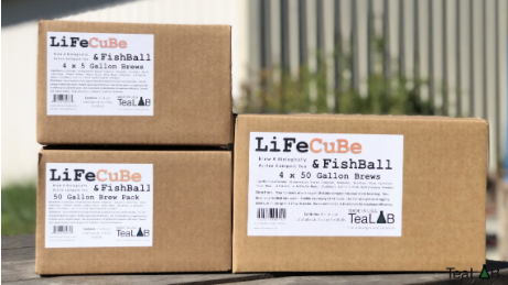 Brown cardboard boxes of LifeCube and FishBall with a white label. 