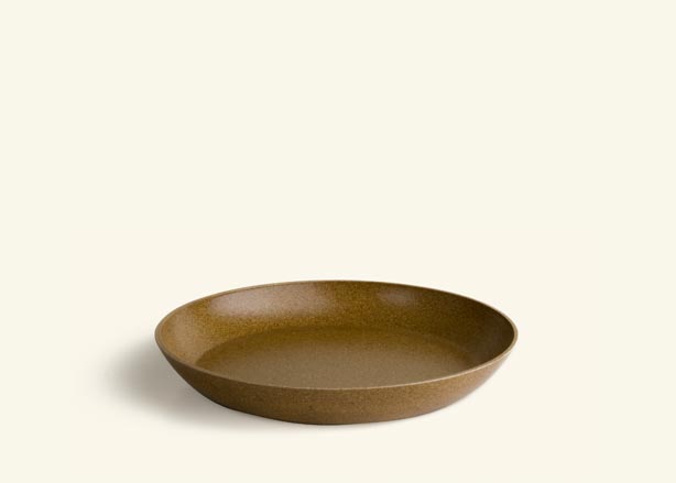 A brown saucer.