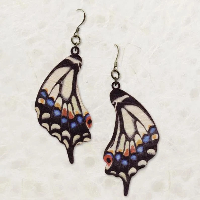 Dangling earrings resembling old world swallowtail butterfly wings.