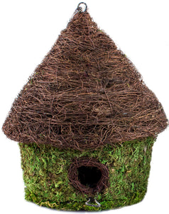 A hanging birdhouse with a tall, brown woven roof and green mossy bottom. There is a small hole for birds to enter through near the bottom.