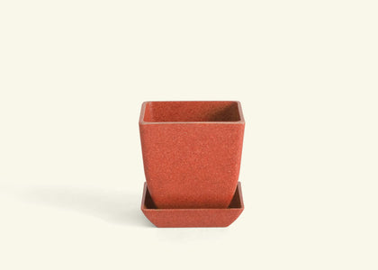 A red square pot.